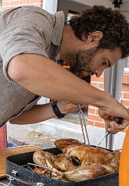 Doug carves the turkey